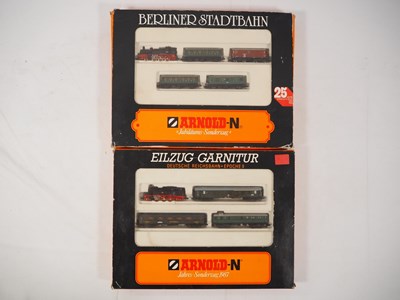 Lot 96 - ARNOLD - pair of N gauge train packs...