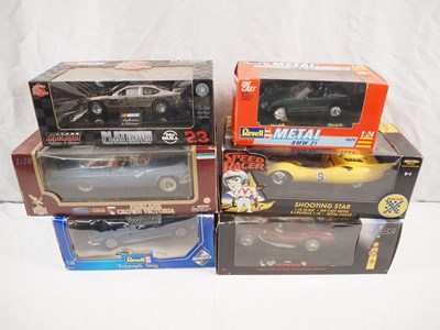 Lot 447 - Group of 1:18 and 1:24 scale diecast cars by...
