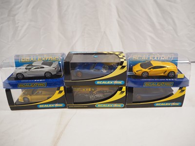 Lot 518 - SCALEXTRIC - A group of boxed 1:32 scale slot...