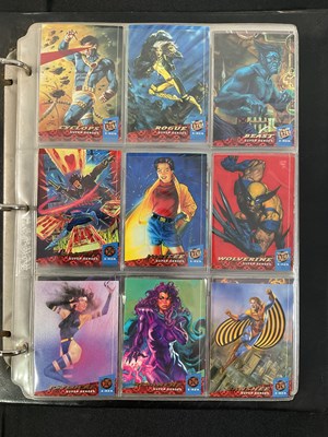 Lot 561 - A folder of MARVEL trading cards comprising...