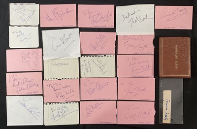 Lot 519 - An autograph book and a various loose...