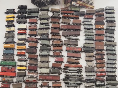 Lot 272 - OO Gauge mixed wagons by HORNBY, MAINLINE and...
