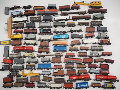 Lot 277 - A group of OO gauge mixed wagons by HORNBY and...