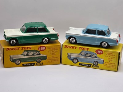 Lot 544 - DINKY - A pair of diecast 189 Triumph Heralds...