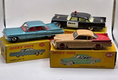 Lot 550 - DINKY - A group of diecast cars comprising a...