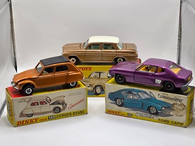 Lot 557 - DINKY - A group of diecast cars comprising a...