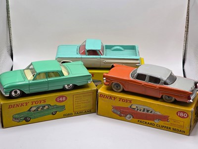 Lot 558 - DINKY - A group of diecast cars comprising a...