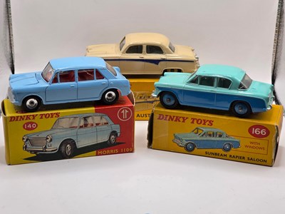 Lot 563 - DINKY - A group of diecast cars comprising a...