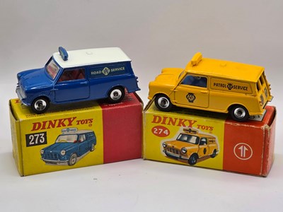 Lot 570 - DINKY - A pair of diecast Mini vans comprising...