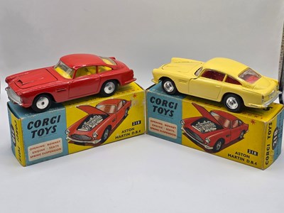 Lot 580 - CORGI - A pair of diecast 218 Aston Martin...