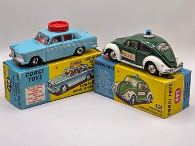 Lot 591 - CORGI - A pair of diecast 'steering' cars...