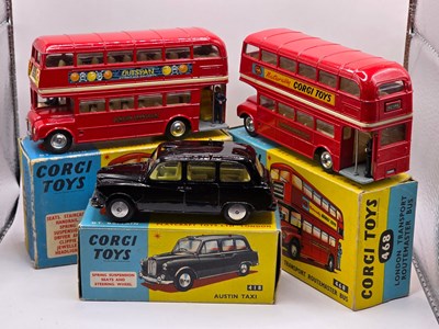 Lot 595 - CORGI - A group of diecast vehicles comprising...