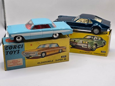 Lot 605 - CORGI - A pair of diecast Oldsmobiles...