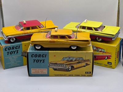 Lot 610 - CORGI - A group of diecast American Taxis...