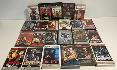 Lot 532 - A collection of action films on VHS and...