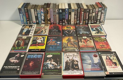Lot 533 - A large quantity of horror films on VHS tapes,...