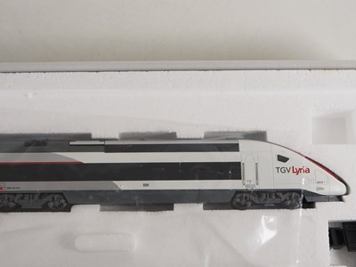 Lot 38 - TRIX HO gauge French outline 22260 TGV Lyria 4-...