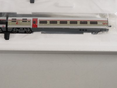 Lot 38 - TRIX HO gauge French outline 22260 TGV Lyria 4-...