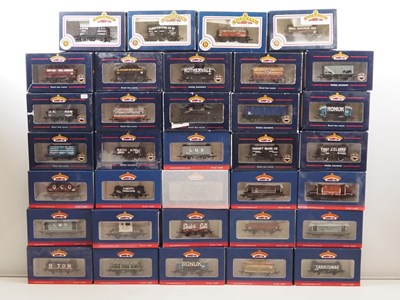 Lot 200 - BACHMANN OO gauge mixed wagons in various...