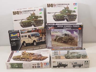 Lot 398 - A group of part built / unbuilt plastic kits...