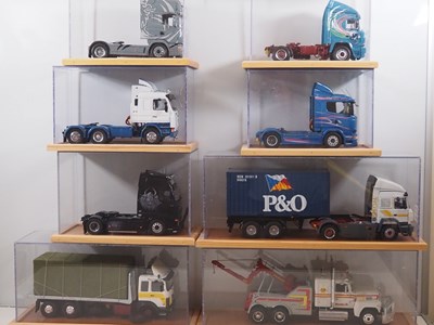 Lot 404 - A group of built 1:24 scale plastic kits of...