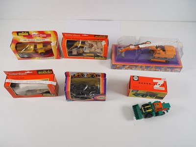 Lot 581 - Diecast construction vehicles and cranes by...