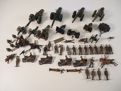 Lot 600 - A group of cast soldiers and artillery guns,...