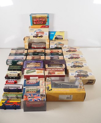Lot 602 - A large group of diecast buses and trams...