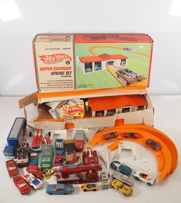 Lot 627 - A group of playworn diecast vehicles by CORGI,...