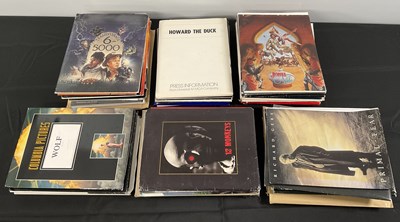 Lot 217 - A box of film press kits, titles include:  THE...