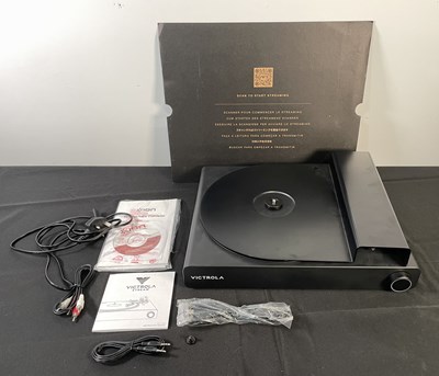 Lot 404 - A VICTROLA STREAM CARBON vinyl record player,...