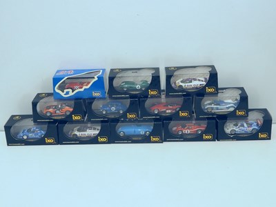 Lot 675 - IXO 1:43 scale diecast racing cars, including...