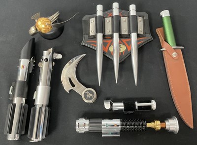 Lot 577 - A collection of movie related prop-replicas,...