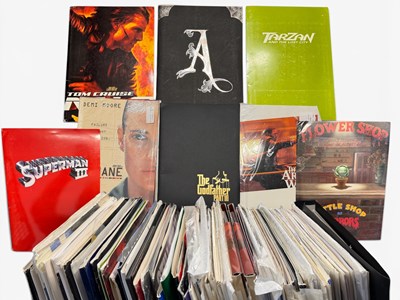 Lot 220 - A crate full of movie press kits that all...