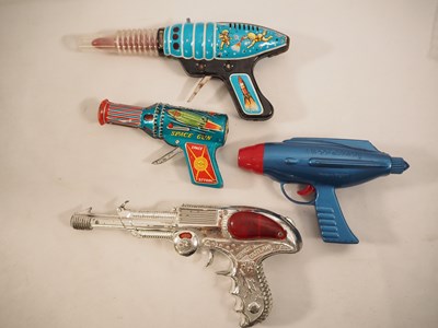Lot 48 - Group of tinplate and plastic Space Guns by...