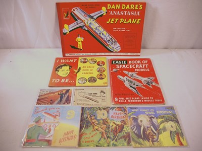 Lot 142 - DAN DARE vintage collectables comprising books,...