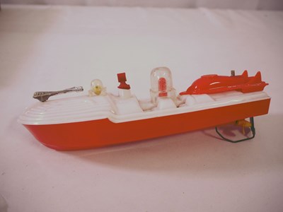 Lot 143 - MERTON scarce DAN DARE clockwork plastic...