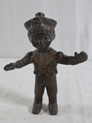 Lot 261 - A Spelter shop display advertising figure of...