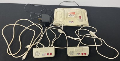 Lot 548 - An AMSTRAD GX4000 Games console with 2...