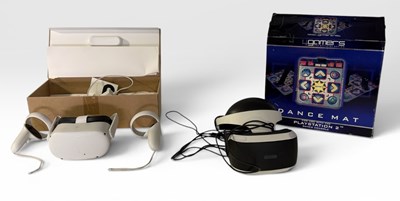Lot 563 - An OCCULUS QUEST 2 boxed VR headset, together...