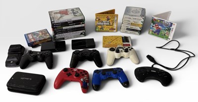 Lot 564 - A mixed retro gaming lot comprising two...