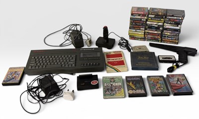 Lot 565 - A SINCLAIR ZX SPECTRUM + 2 games console, with...