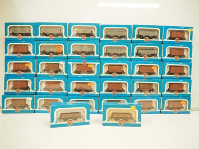 Lot 194 - A large group of OO gauge AIRFIX wagons,...