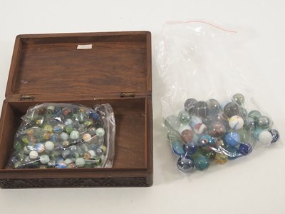 Lot 360 - A carved Indian trinket box full of marbles...