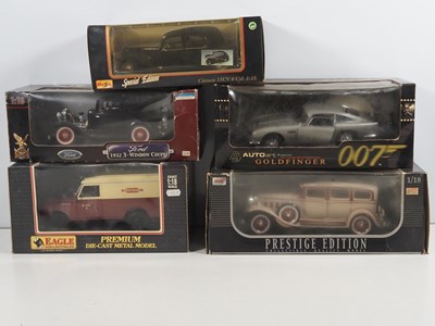 Lot 425 - A group of diecast models comprising an...