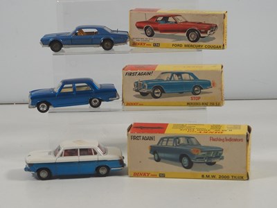 Lot 464 - DINKY - A group of three diecast vehicles...