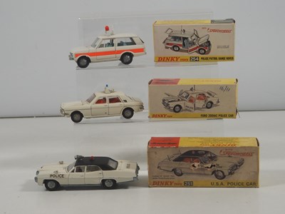 Lot 474 - DINKY - A group of three diecast emergency...