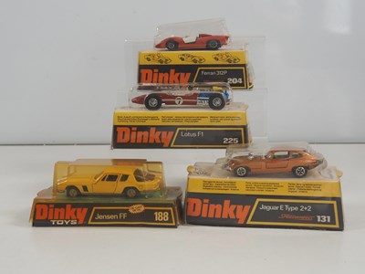 Lot 479 - DINKY - A group of four diecast sports cars in...