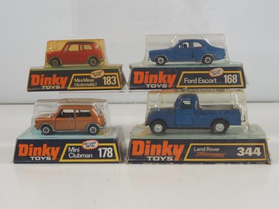Lot 484 - DINKY - A group of four diecast cars in bubble...