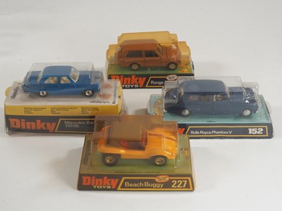 Lot 486 - DINKY - A group of four diecast cars...